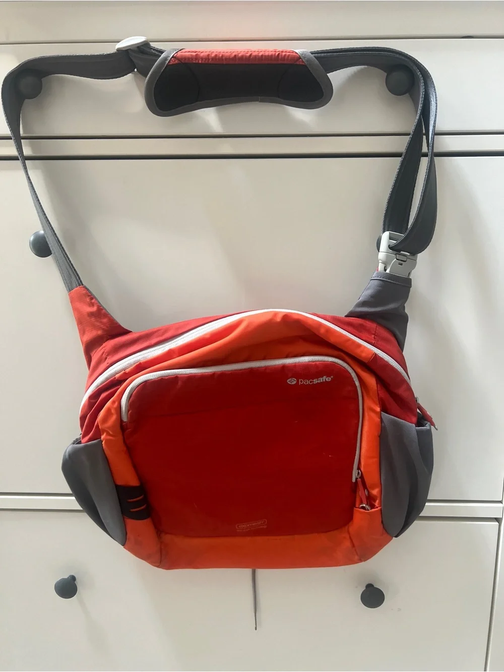 Pacsafe Red and Orange Crossbody Messenger Sling